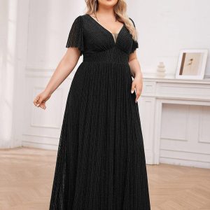 Robe de soirée transparente scintillante col en V taille empire manches courtes