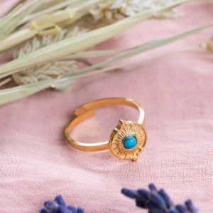 Bague circulaire dorée pierre turquoise