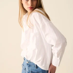 Blouse blanche à rayures relaxées