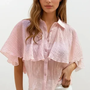 Blouse en mousseline de soie texturée rose à manches tombantes
