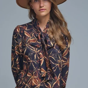 Chemise en mousseline de soie noire à imprimé abstrait et nœud papillon