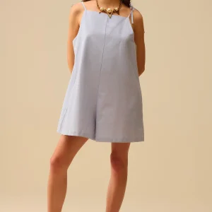 combinaison à rayures bleues avec attaches aux épaules et poches au dos