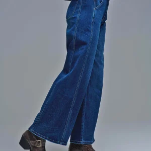 Jeans à jambe extra-large en délavage moyen avec poches latérales
