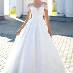 Robe de mariée féérique à paillettes