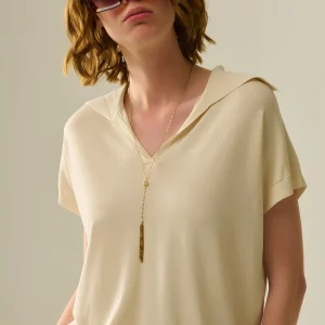 polo en maille fine beige à manches courtes