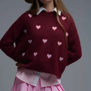 Pull à col ras du cou et cœurs rayés