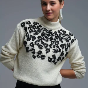 Pull blanc en tricot avec motif abstrait